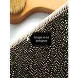 MetropolenSchrift Wohnteppich – Elegante schwarze Bodenmatte für Schlaf- & Wohnräume